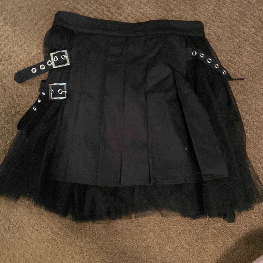 Black skirt with side buckles